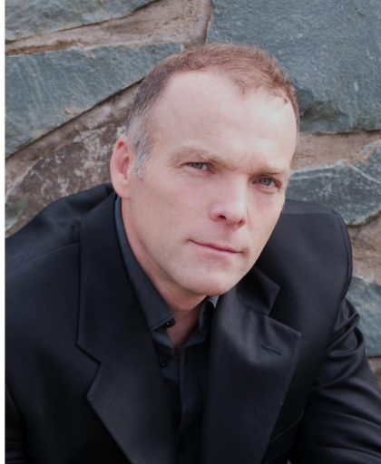 Хью Томпсон